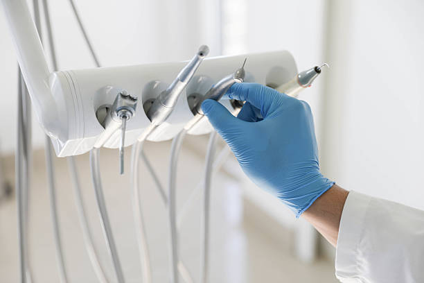 Professional Tooth Extraction technician working in Green Level, NC